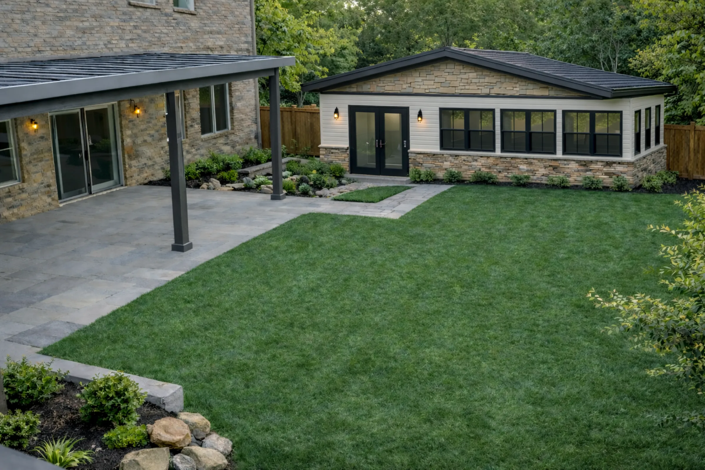 Modern backyard ADU construction behind a residential home with private entrance in Dallas Texas